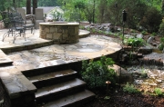 custom designed stone steps, patio, and fire pit