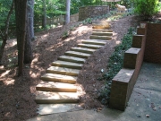 custom designed stone steps and maintained landscape