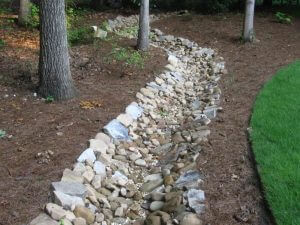 stone drainage after landscaping services